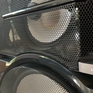 welded metal net frame onto plastic speaker case